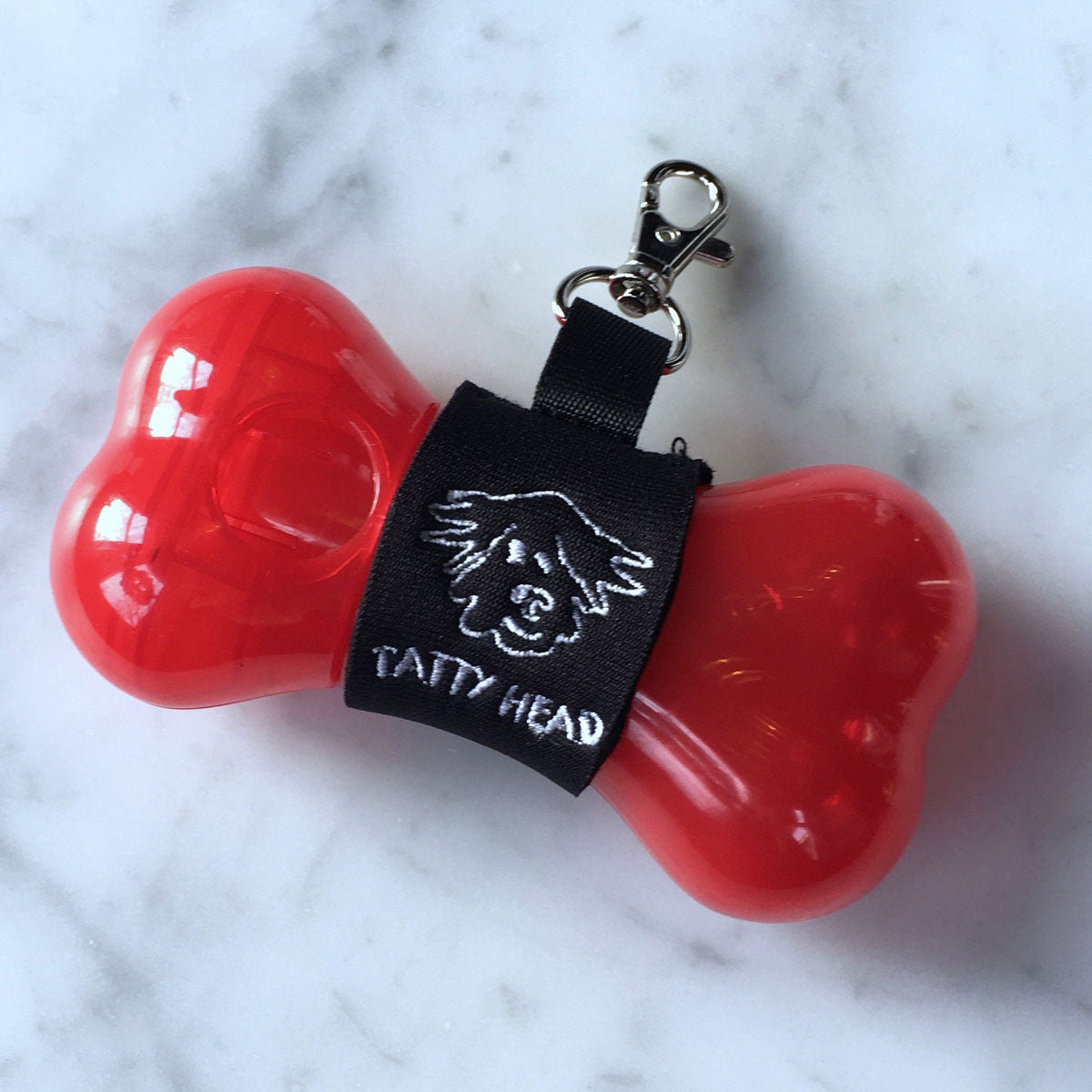 Red Tatty Head Dog Treat Dispenser and Recall Training Aid front view